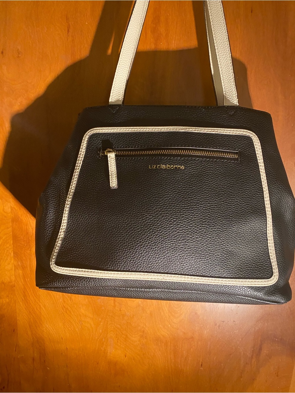 Liz Claiborne black pebble grain faux-leather shoulder tote bag.